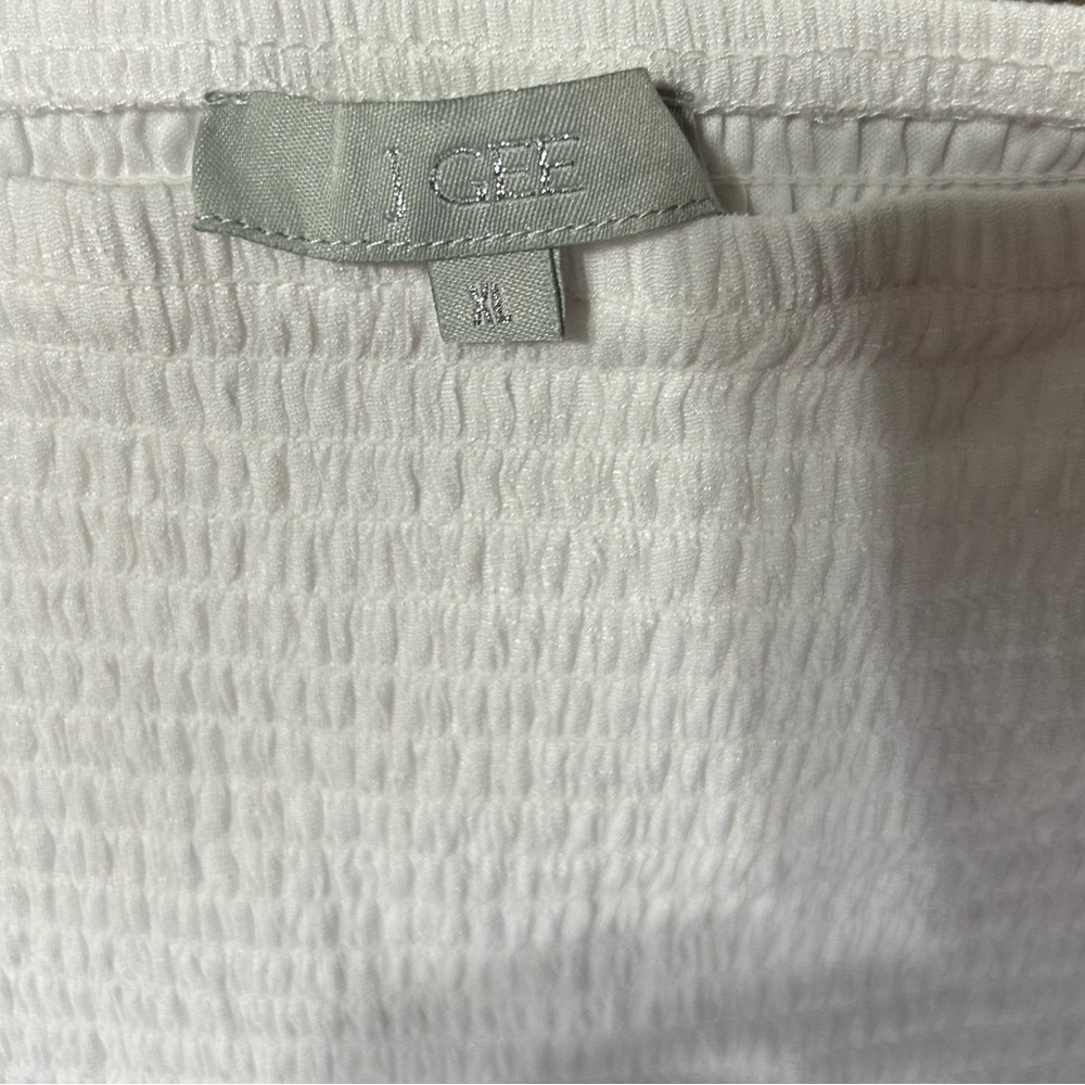 Elegant White Smocked Maxi Dress - Picture 3 of 10